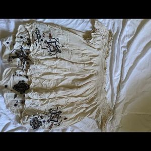 Cream off the shoulder shirt